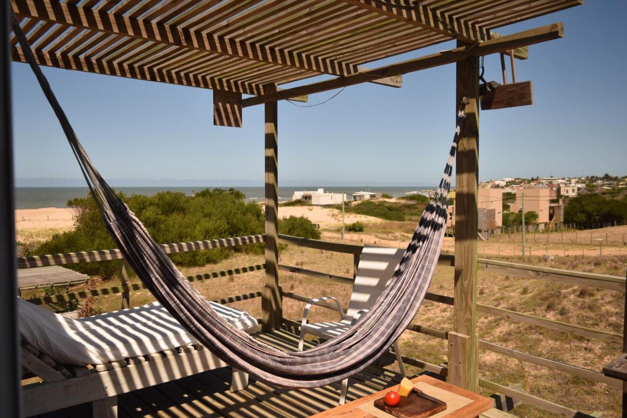 El Palafito Aparthotel La Pedrera Luaran gambar