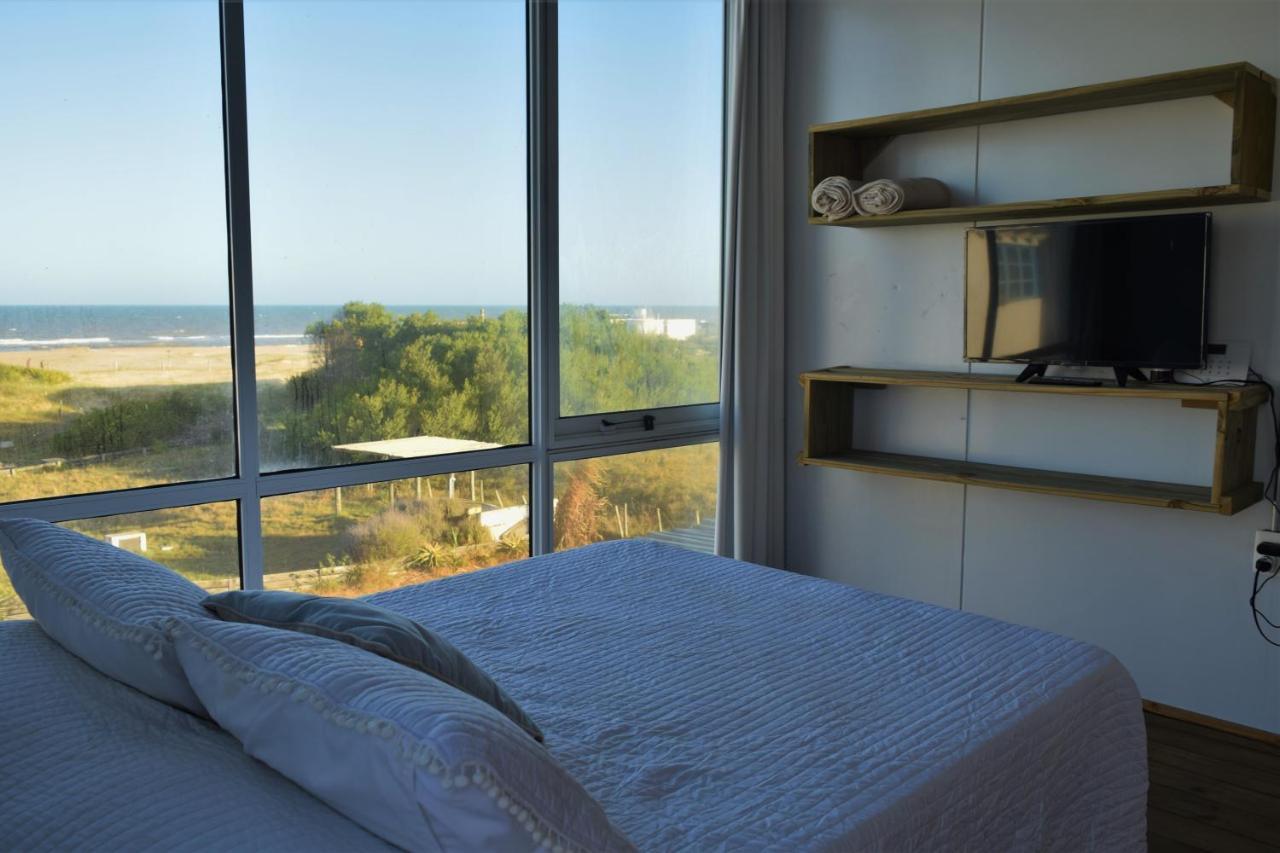 El Palafito Aparthotel La Pedrera Luaran gambar
