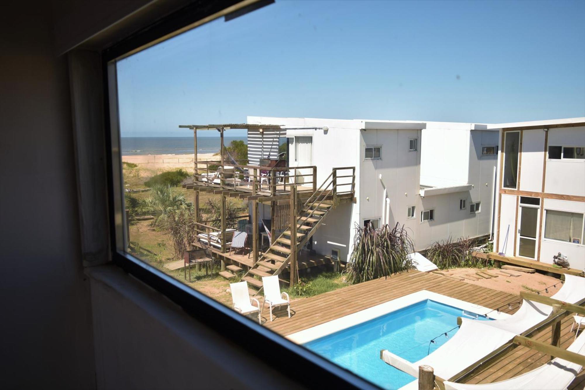 El Palafito Aparthotel La Pedrera Luaran gambar